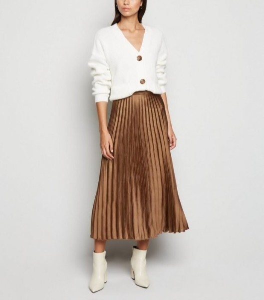 Бесподобные летние юбки 2022 2023 года: модные тенденции на фото